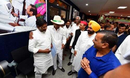KCR presents Bhatti to Delhi CM Kejriwal