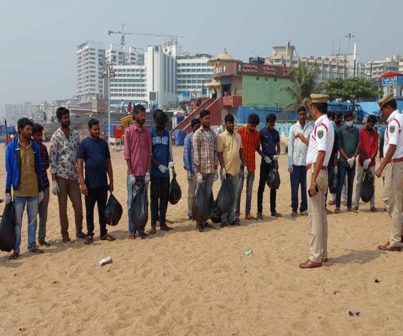 Video recording: Drunk driving offenders made to free from dirt Vizag’s RK shore as punishment