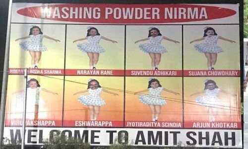  BRS welcomes Shah with ‘Washing fine-grained substance Nirma’ posters