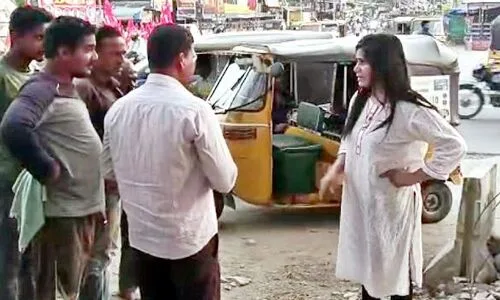 Drunk woman causes disturbance in Jagtial, throws stones at auto-rickshaw driver over fare payment issue.