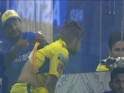 Possible rewritten title: “CSK Captain MS Dhoni’s Lower Back Treatment Picture Goes Viral, Sparking Speculation on Possible Injury”