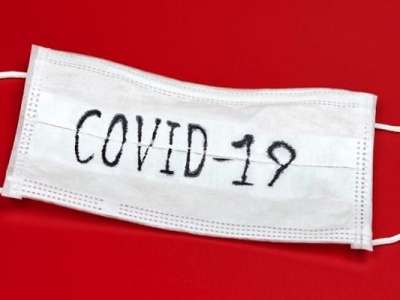 China health official warns of continued risks despite end of COVID global emergency