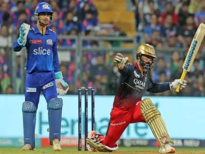 During IPL 2023 Match, RCB Coach Sanjay Bangar Reports Dinesh Karthik’s Illness and Vomiting.