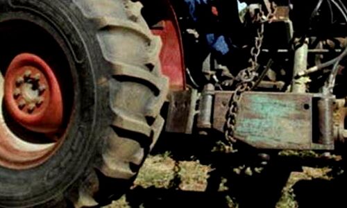Farmer sleeping under tarpaulin cover in Karimnagar run over by tractor