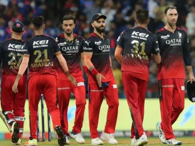 Here’s a possible rewrite:How RCB Can Qualify for IPL 2023 Playoffs Despite Loss to MI