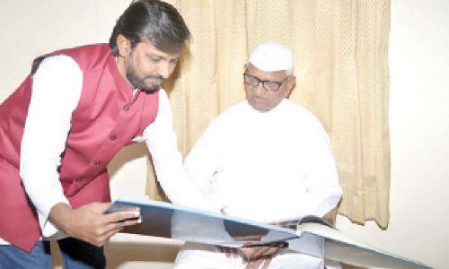 Social Worker Book Released by Anna Hazare in Karimnagar