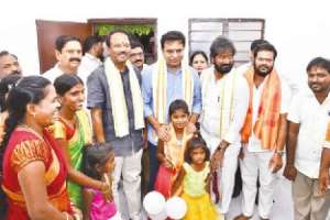 Beneficiaries receive 560 2BHK houses from KTR