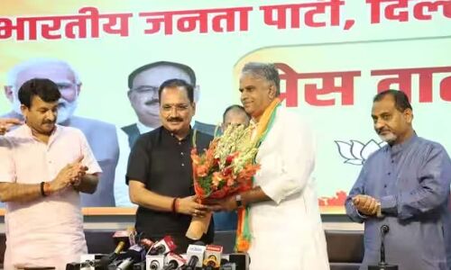 BJP welcomes two AAP leaders into its fold