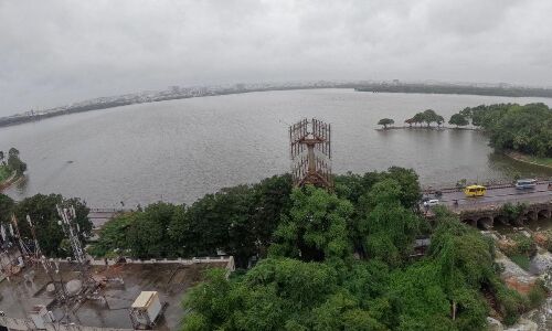 City’s Hussainsagar Lake filled to the brim with heavy monsoon rainfall