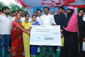 Distribution of flood relief aid in Khammam
