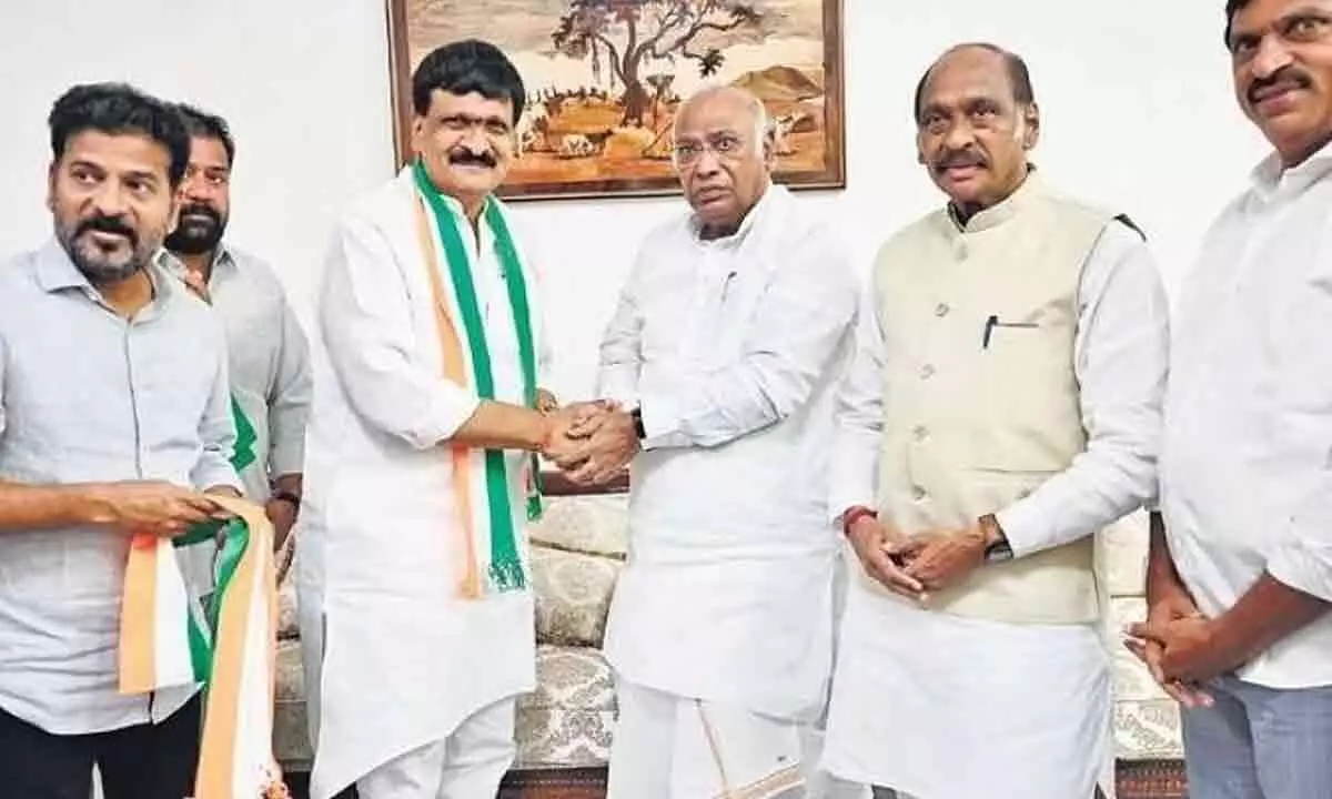 Mynampally Hanumanth Rao and his son M Rohit join Congress in Delhi from Hyderabad