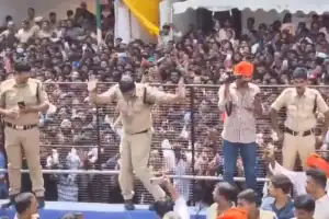 Police get into the rhythm of traditional dhol-tasha during Ganesh immersion
