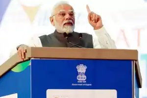 Prime Minister Narendra Modi predicts India to become a global economic powerhouse in the near future, Ahmedabad reports.