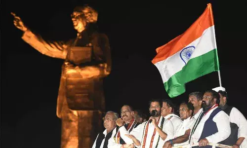 Revanth questions Asad about their involvement in KCR’s assets