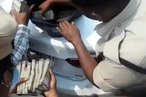 Police in Hyderabad seize large amounts of cash during vehicle checks in election code enforcement.