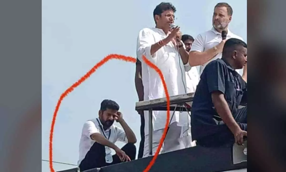 Revanth Reddy takes a break from the sweltering heat during Congress Bus Yatra