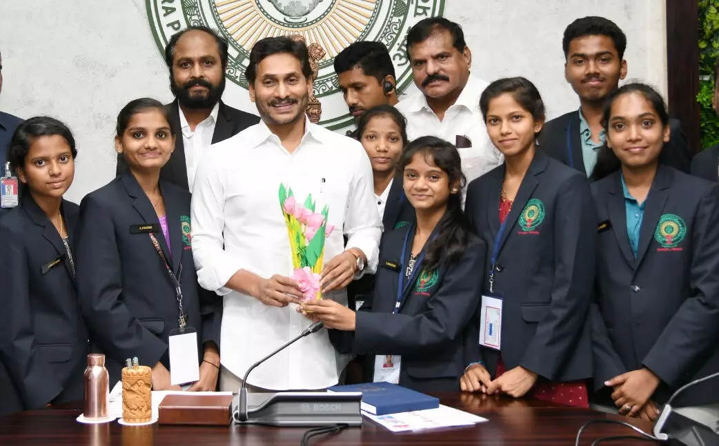 YS Jagan meets students from AP Government schools who returned from the US