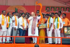 Amit Shah guarantees complete empowerment of tribal communities