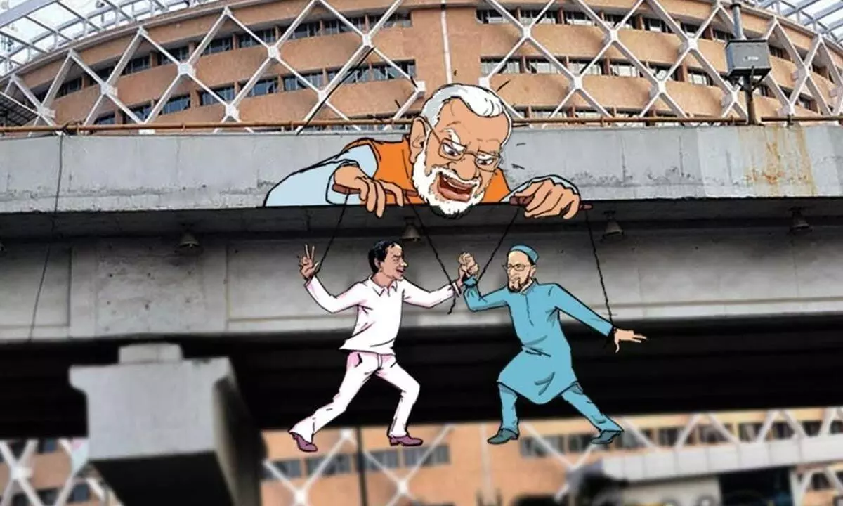 Congress puts up posters portraying KCR and Owaisi as puppets under PM Modi’s control