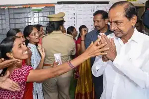K Chandrasekhar Rao and his wife exercise their voting rights in Chintamadaka, Hyderabad.
