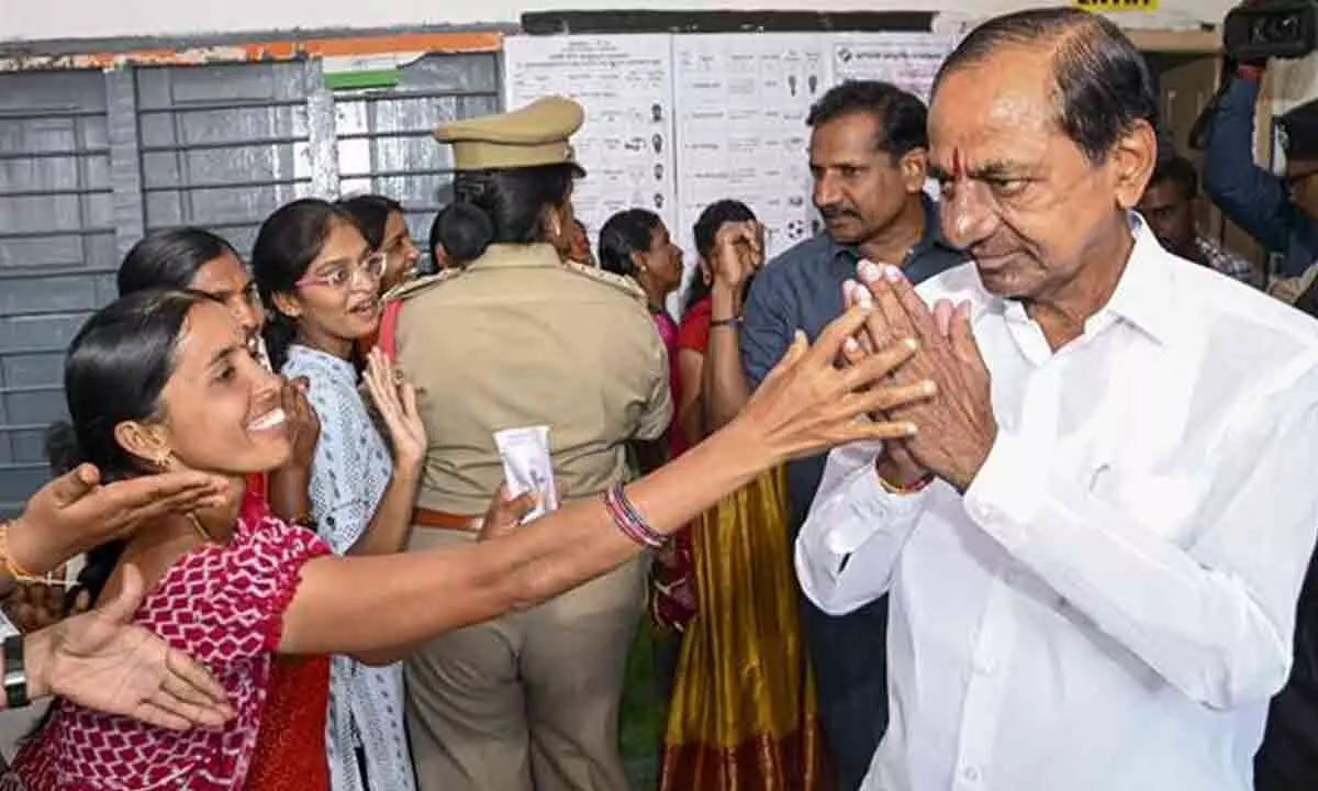 K Chandrasekhar Rao and his wife exercise their voting rights in Chintamadaka, Hyderabad.