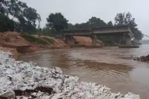 Thoroughfare Left Covered in Mud Following Heavy Rains