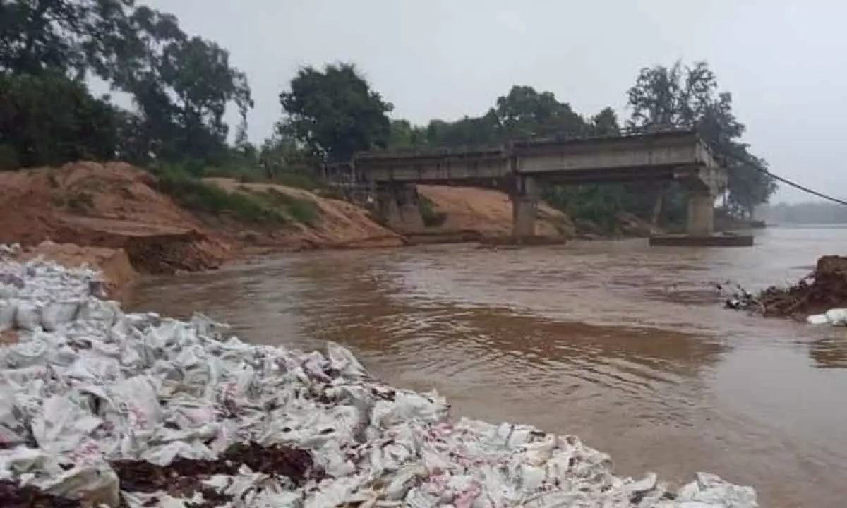 Thoroughfare Left Covered in Mud Following Heavy Rains