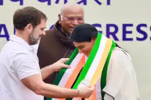 YS Sharmila joins Congress, willing to assume any role