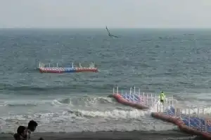 Floating bridge breaks away at RK Beach, leaving tourists disappointed a day after launch
