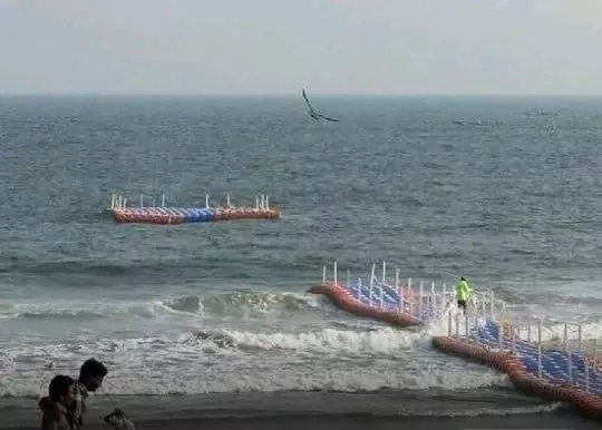 Floating bridge breaks away at RK Beach, leaving tourists disappointed a day after launch