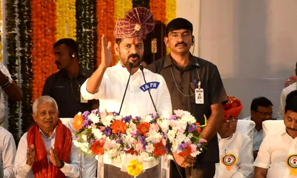 Revanth Reddy joins Sant Sewalal Jayanti celebrations, commits to constructing schools in Tandas