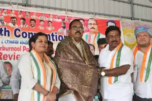Candidate Mallu Ravi pays a visit to Achampeta during election campaign