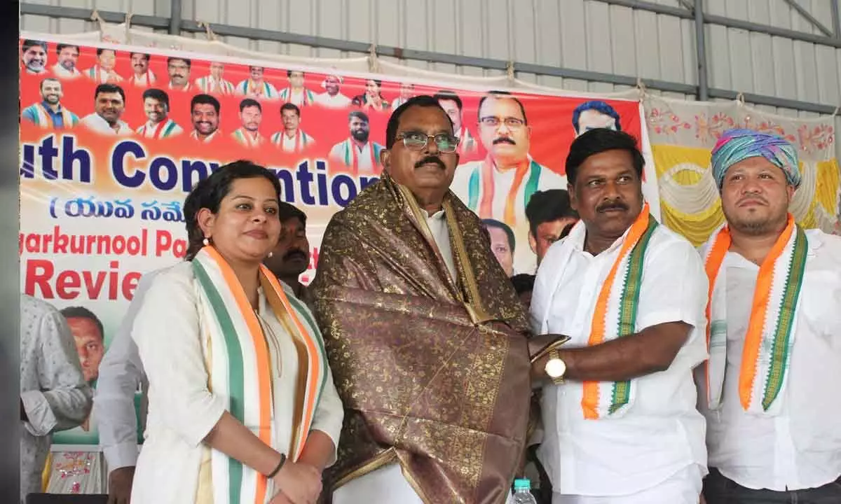 Candidate Mallu Ravi pays a visit to Achampeta during election campaign