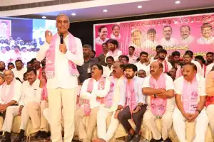 Harish leads BRS members in a rally