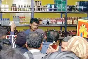 Bar owners and wine shop dealers engage in battle impacting TG Excise revenue.