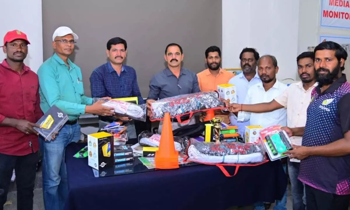 Collectorate AO Chandrasekhar distributes sports equipment for summer sports training camps