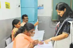 District Collector Ila Tripathi Joins Queue to Vote in MLC By-Election