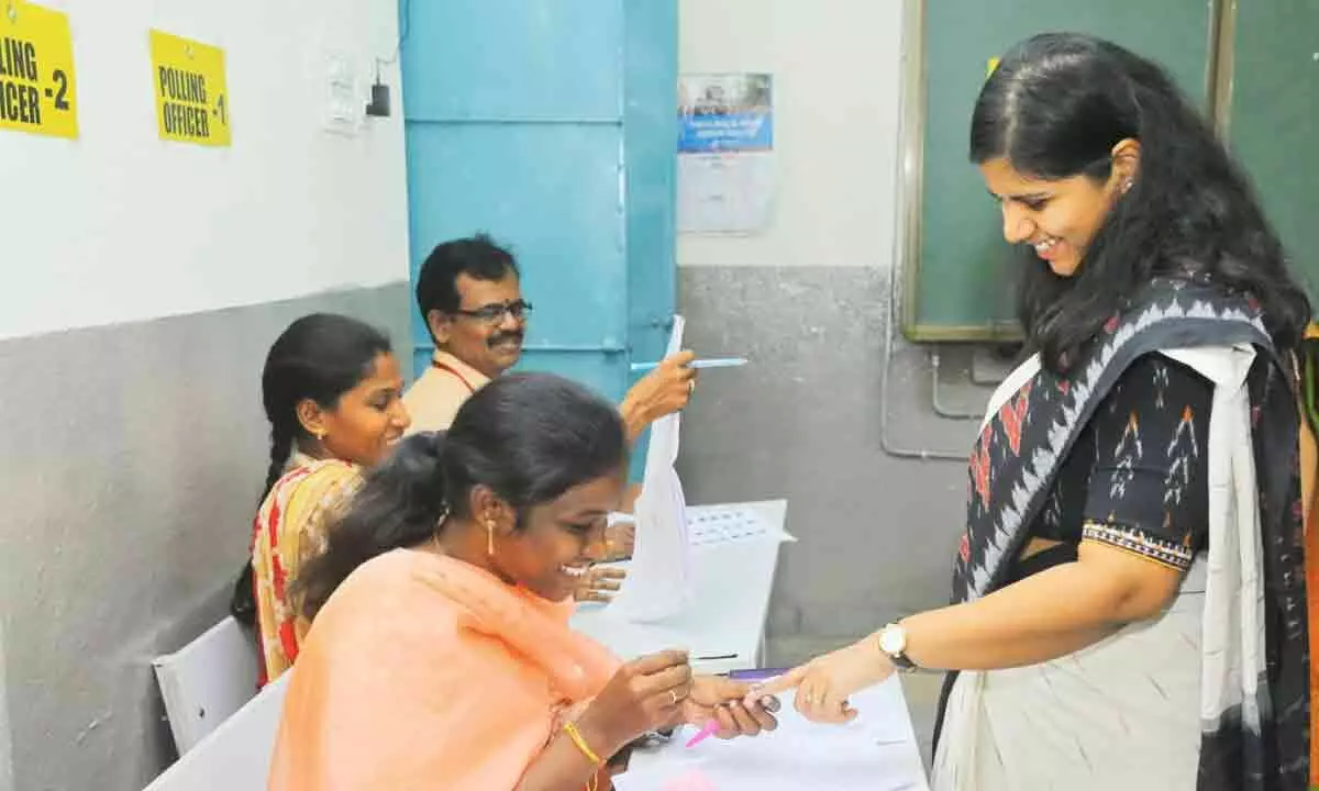 District Collector Ila Tripathi Joins Queue to Vote in MLC By-Election