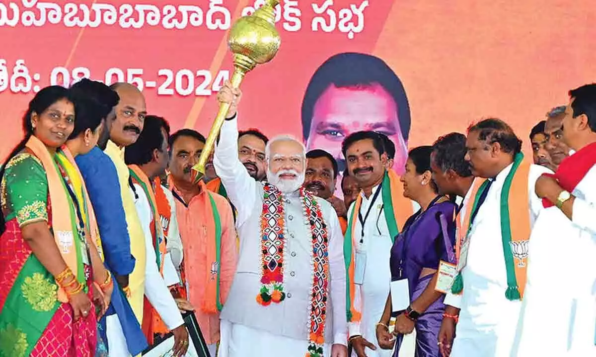 Modi questions the deal made by Cong with Ambani and Adani