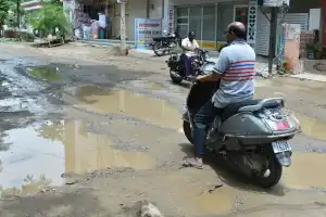 Motorists in Hyderabad face challenges due to damaged roads caused by heavy rain
