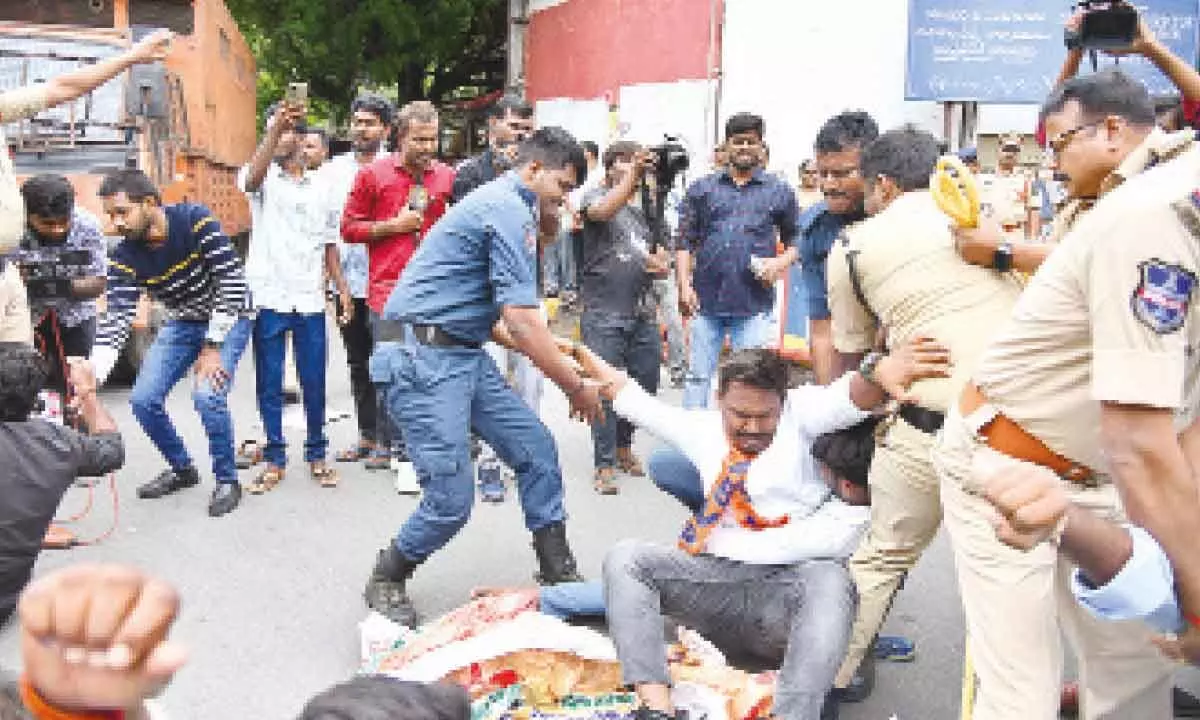 ABVP members protest private school managements by staging dharna