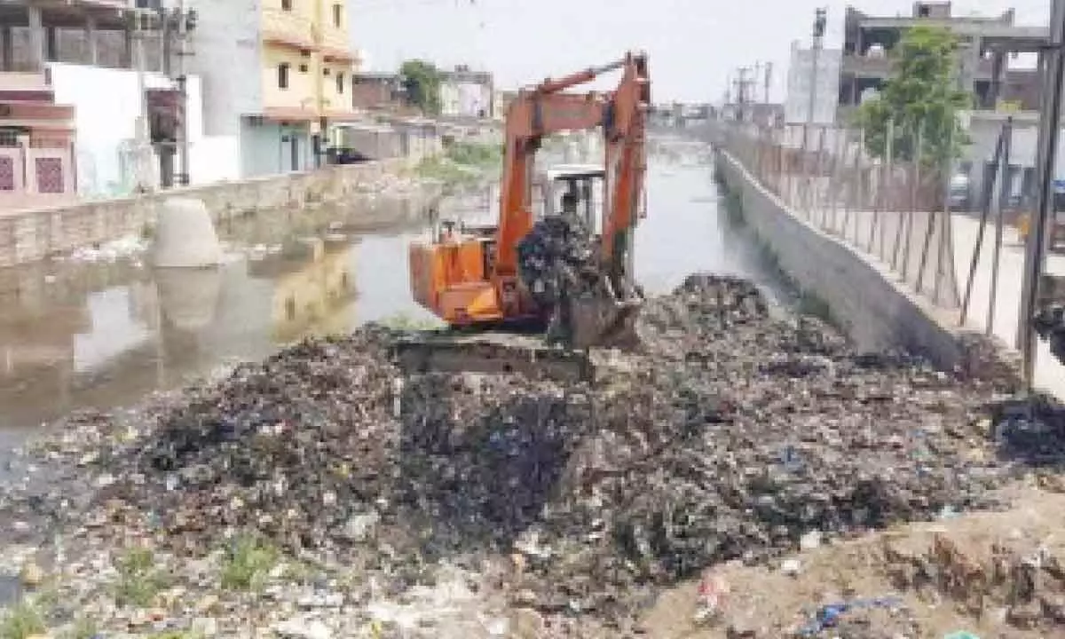 Cleaning of large drains in GHMC area in progress