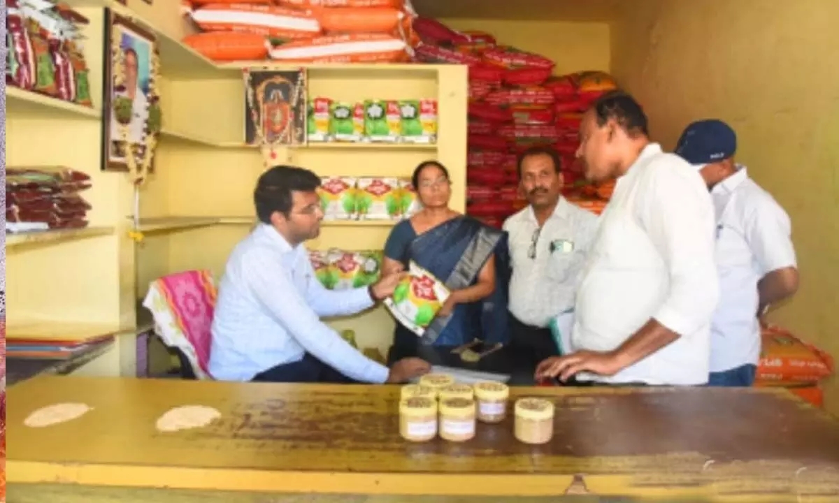 DC inspects PACS and pesticides shop in Gadwal following impact of Hans
