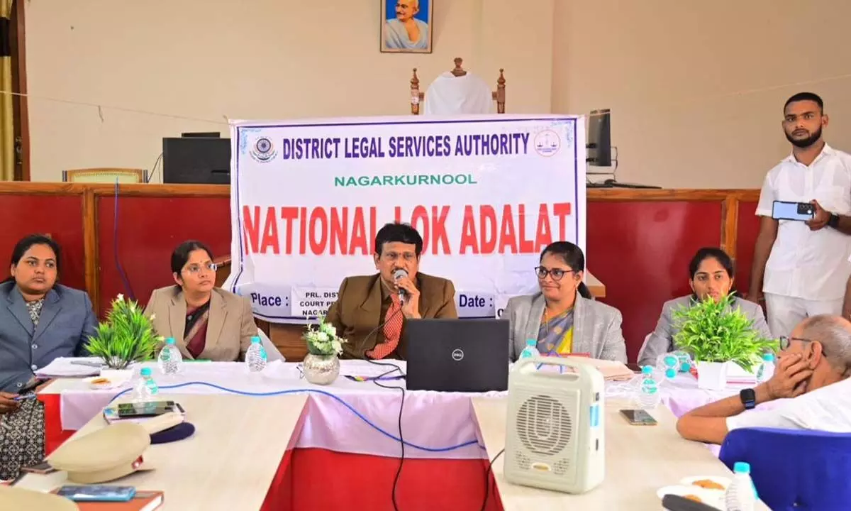 District Chief Justice D Rajesh Babu encourages the use of National Lok Adalat for case resolution.