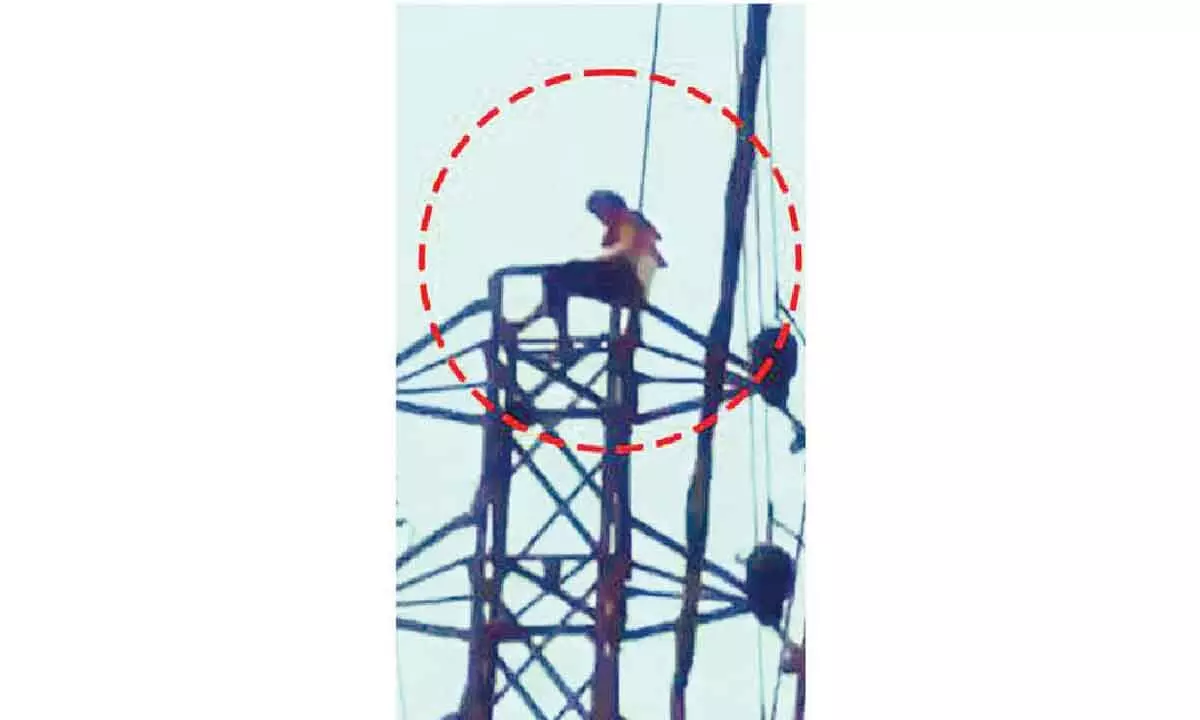 Man scales electricity tower following dispute with spouse