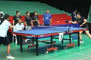 Power Grid Corp organizes table tennis tournament