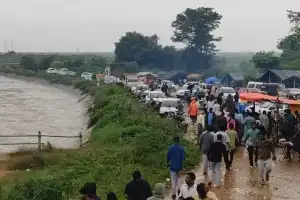 Heavy Flooding at Jurala Attracts Large Crowds