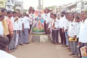 Photos of CM and Minister Seethakka receiving Palabhishekam