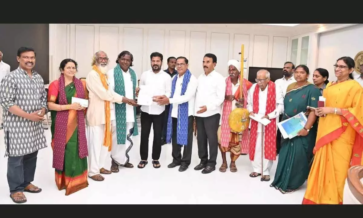 Revanth presents Padma Shri awardees with Rs 25L cheques