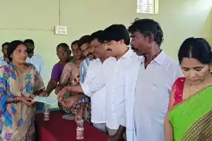 Alampur MLA Vijayudu Hands Out Kalyana Lakshmi and Shaadi Mubarak Cheques at Aiza Tahsildar Office.